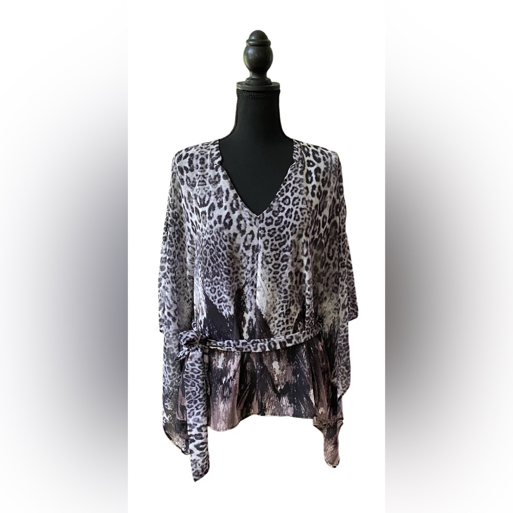 Jennifer Lopez: Animal Print V-Neck Blouse with Dolman Sleeves